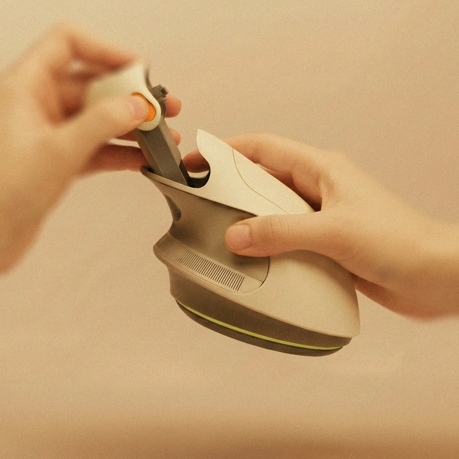 Gentra device cradled in a hand against a soft beige backdrop